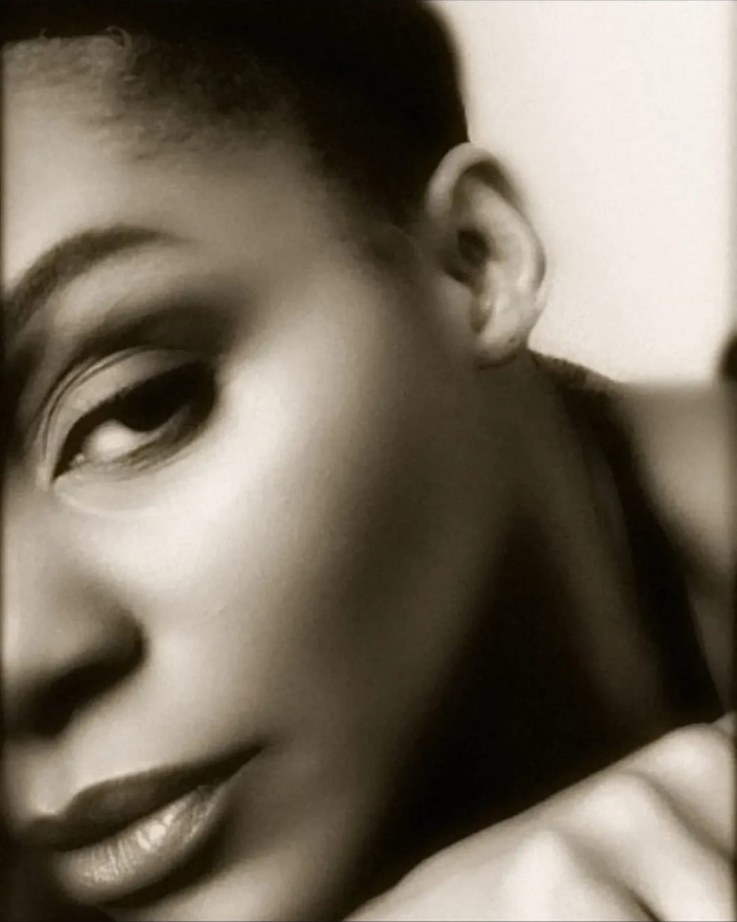 Jakie Lu — sepia close-up portrait